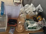 many plastic containers and containers on a table