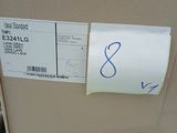 a cardboard box with a sticker on it with a price tag attached to it