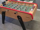 a foosball table in the middle of a room