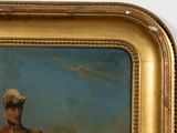 portrait of a man in a military uniform in a gold frame