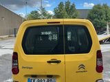 yellow citroen van parked in a parking lot in a parking lot
