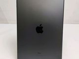 an apple ipad is sitting on a table with a white background