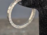 a close up of a ring on a piece of cloth