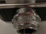 a close up of a camera with a lens attached to it