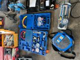 a lot of tools that are sitting on the floor