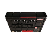 an image of a black and red game console