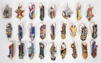a lot of pins that are on a white surface