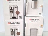 three boxes of brabantia coffee maker sitting on a table