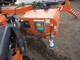 a machine that is sitting on the ground in the dirt