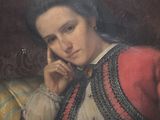 tableau représentant une femme en robe rouge assise sur un canapé