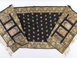 three pieces of cloth with different designs on them on a white surface