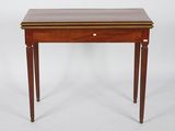 a small wooden table with a drawer on top of it