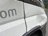 a white van with the word zoom written on the side