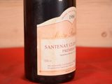 a bottle of wine that is sitting on a table