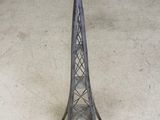 an image of a metal candle holder with a candle in it