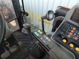 a close up of a control panel in a tractor