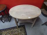 a table and two chairs in a room with a red wall