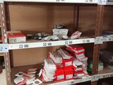 a shelf with many items on it in a store