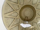 a clock that is on the ceiling of a building