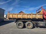 a dump truck that is parked in a parking lot