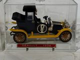 a small model of a car in a clear box