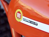 a close up of a motorcycle with a sticker on it