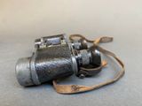 a close up of a pair of binoculars on a table