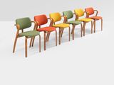 a set of six chairs with colorful upholstered seats
