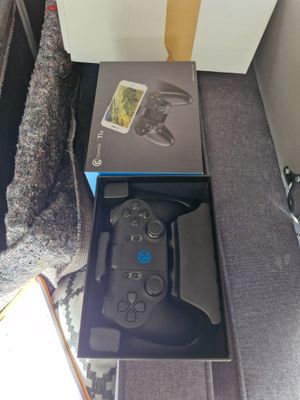 a box that has a game controller in it