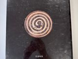 a picture of a cd with a spiral design on it