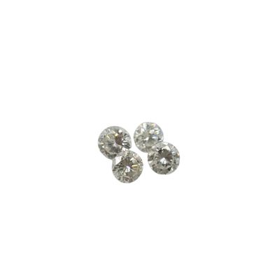 three diamonds on a white surface with a white background