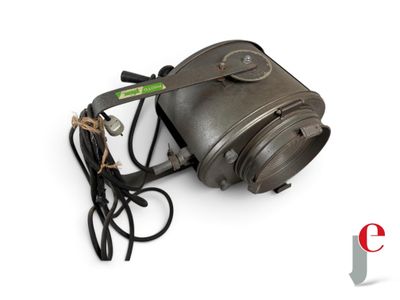 an old camera with a cord attached to it