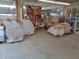 a large room with a lot of boxes and shelves