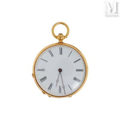 une montre de poche en or avec des chiffres romains sur le cadran
