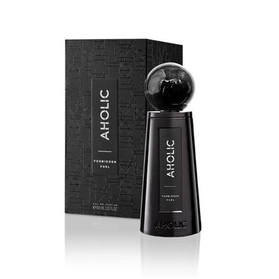 un flacon d'eau de Cologne noir à côté d'une boîte noire