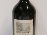 a bottle of wine that is sitting on a table