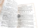 an open book with a black and white image on it