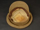 a brown hat with a brown leather band and a brown hat with a brown leather band and a brown hat with a brown leather band