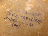 a close up of a piece of bread with writing on it