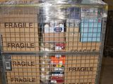 a cart with many boxes on it in a warehouse