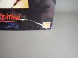 a box with a picture of a person holding a knife