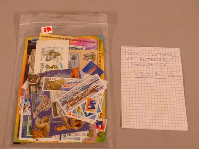 a bag of stamps and a piece of paper on a table