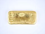 a gold bar on a white background