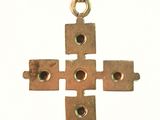 an image of a cross made out of four pieces of metal