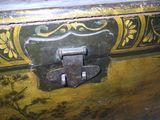 a close up of a wooden box with a latch on it
