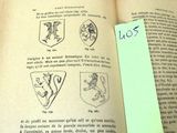 an open book with a yellow sticker attached to it