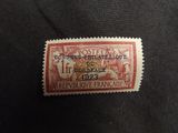 a stamp with a picture of a man and woman on it