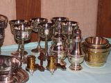 a lot of silver items on the table