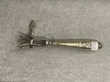 a knife that is laying on top of a table