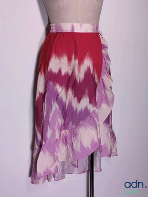 pink and purple tie dye skirt on a mannequin dummy